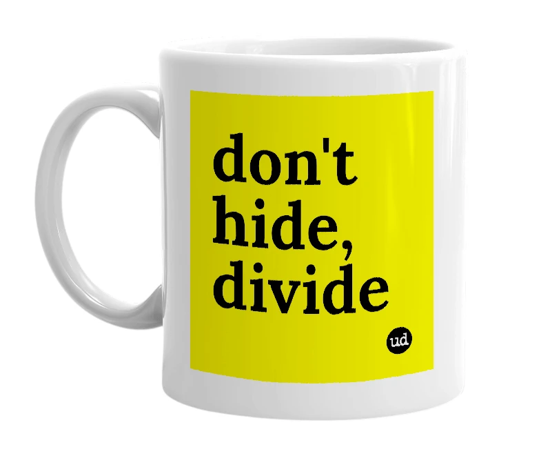 White mug with 'don't hide, divide' in bold black letters