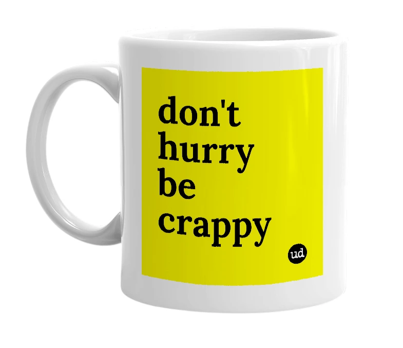 White mug with 'don't hurry be crappy' in bold black letters