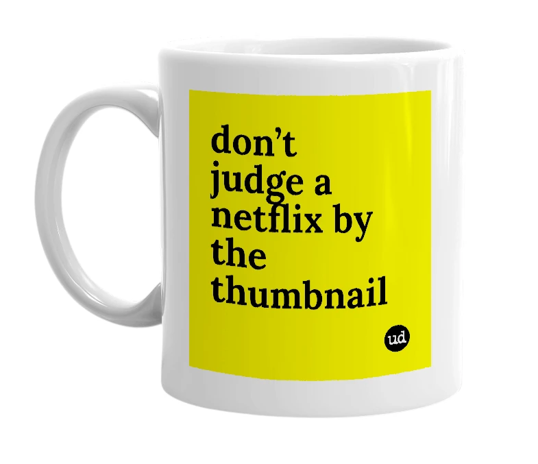 White mug with 'don’t judge a netflix by the thumbnail' in bold black letters