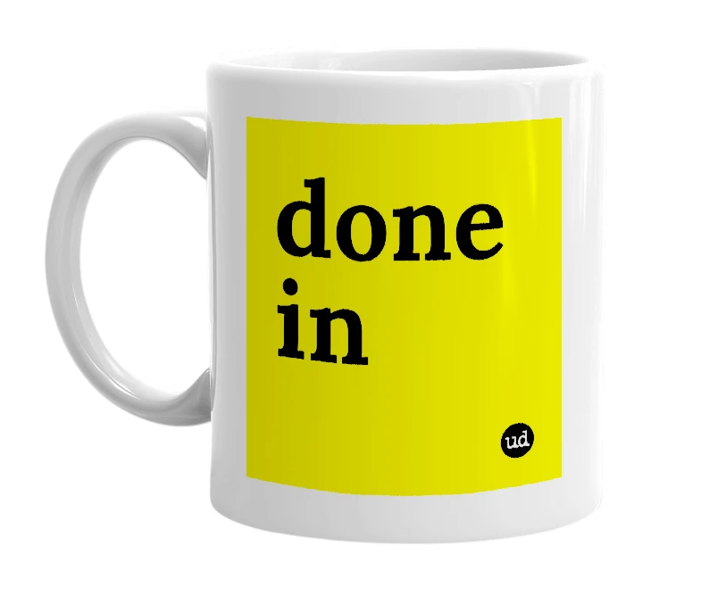 White mug with 'done in' in bold black letters