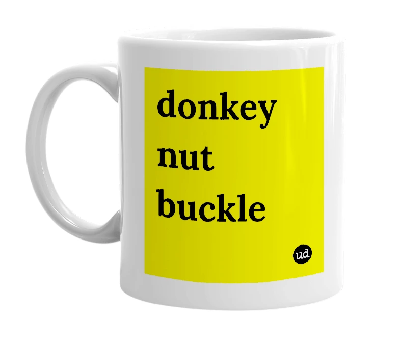 White mug with 'donkey nut buckle' in bold black letters