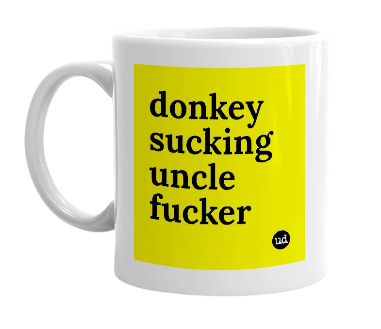 White mug with 'donkey sucking uncle fucker' in bold black letters