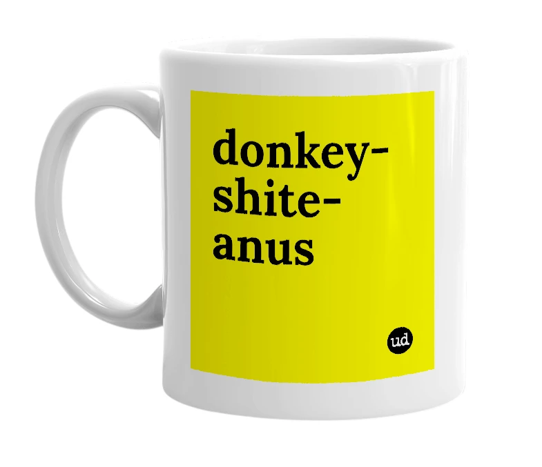 White mug with 'donkey-shite-anus' in bold black letters