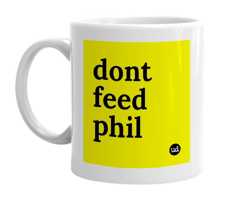White mug with 'dont feed phil' in bold black letters