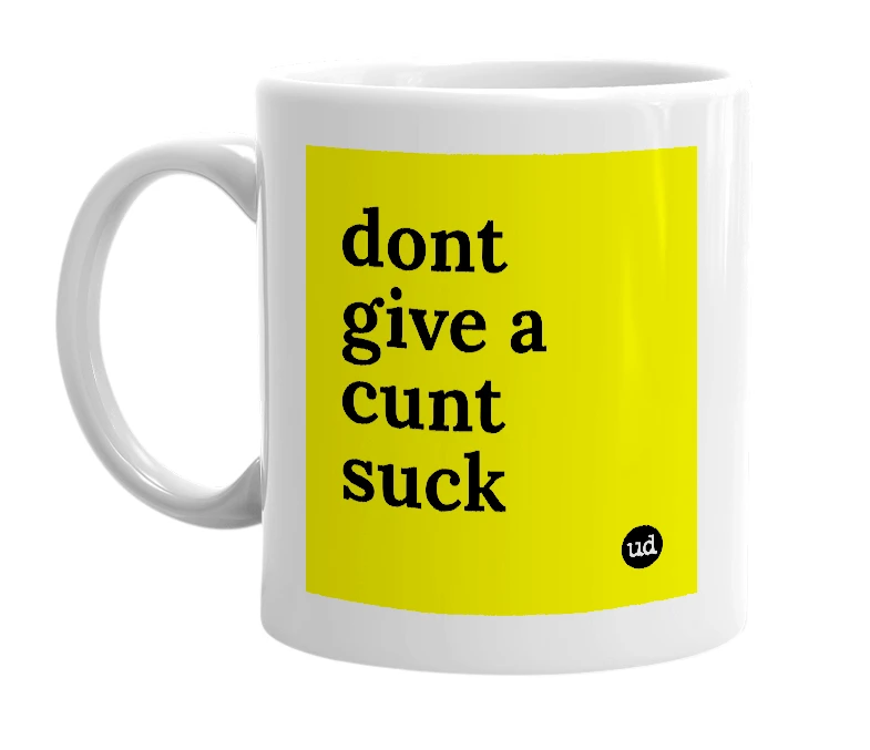 White mug with 'dont give a cunt suck' in bold black letters