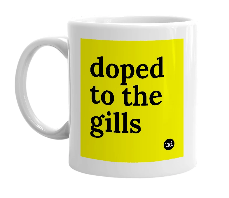 White mug with 'doped to the gills' in bold black letters