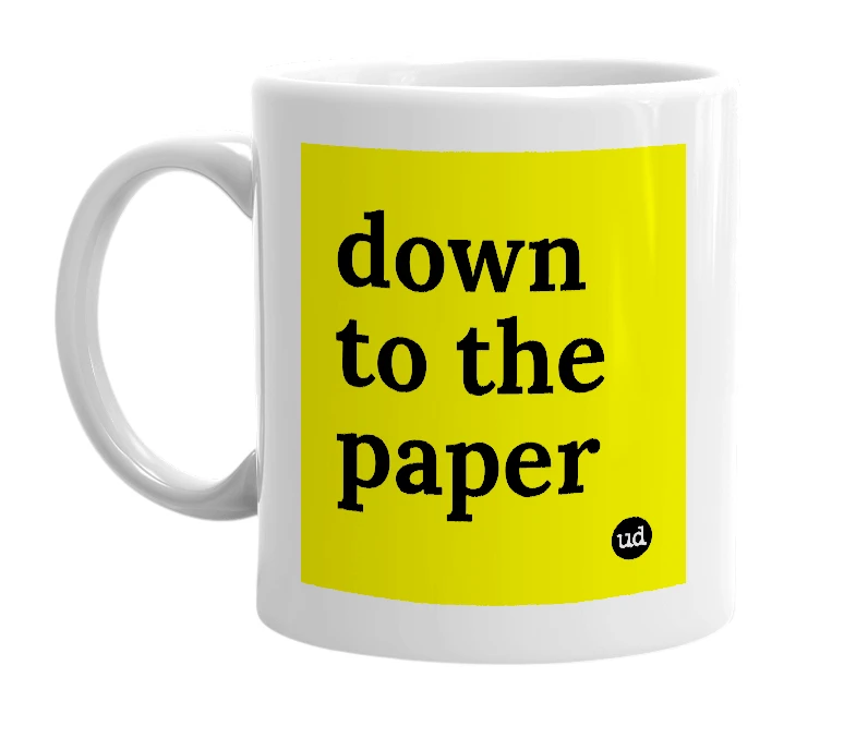 White mug with 'down to the paper' in bold black letters