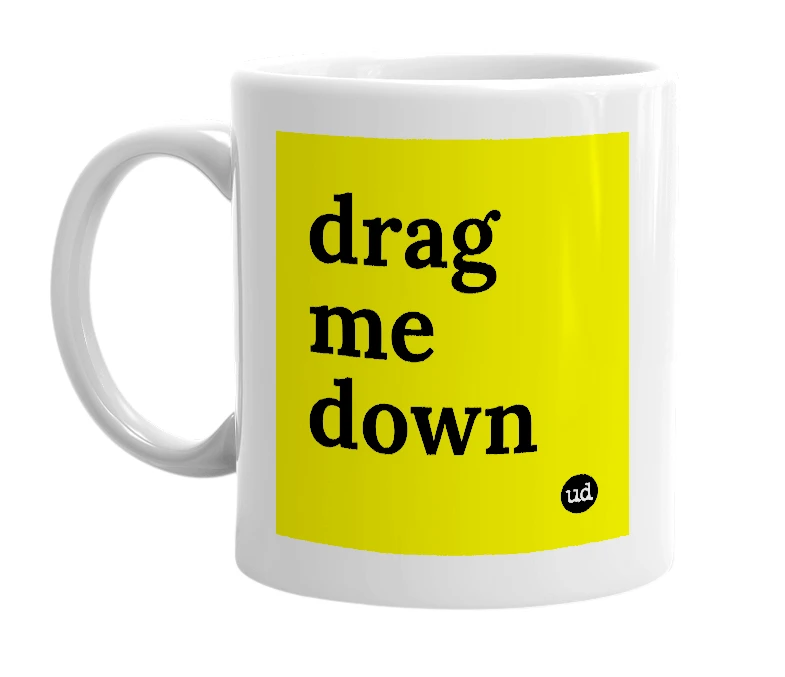 White mug with 'drag me down' in bold black letters