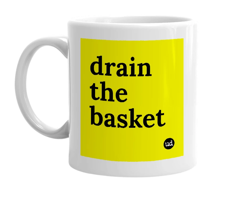 White mug with 'drain the basket' in bold black letters