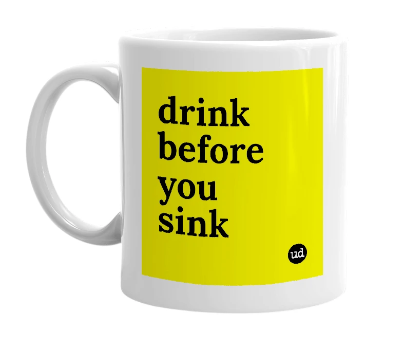 White mug with 'drink before you sink' in bold black letters