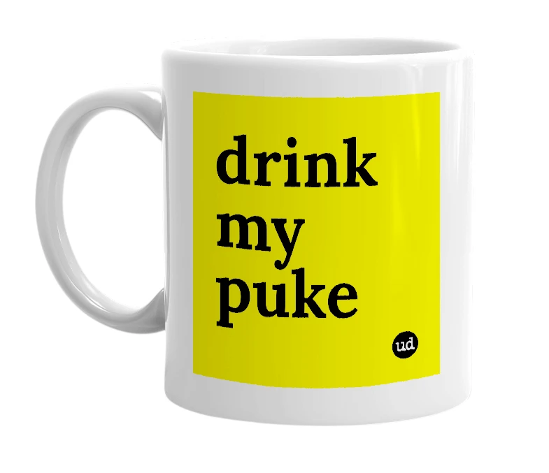 White mug with 'drink my puke' in bold black letters