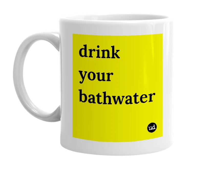 White mug with 'drink your bathwater' in bold black letters