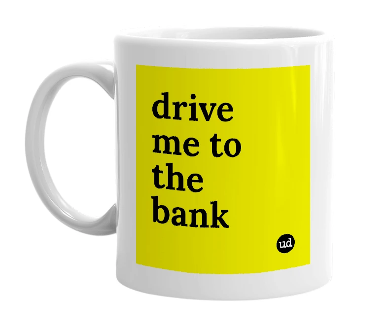 White mug with 'drive me to the bank' in bold black letters