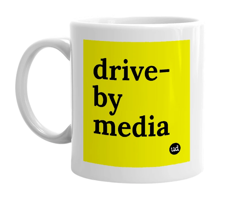 White mug with 'drive-by media' in bold black letters