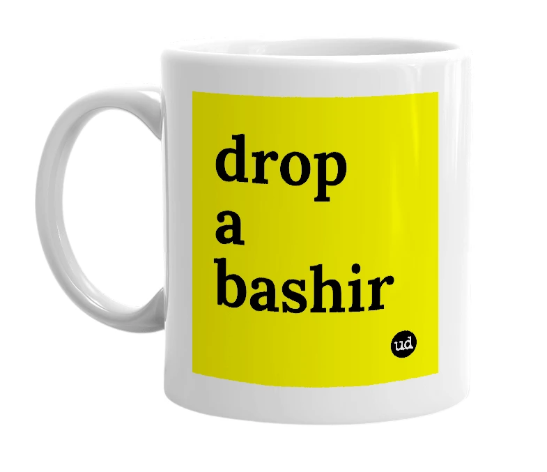White mug with 'drop a bashir' in bold black letters