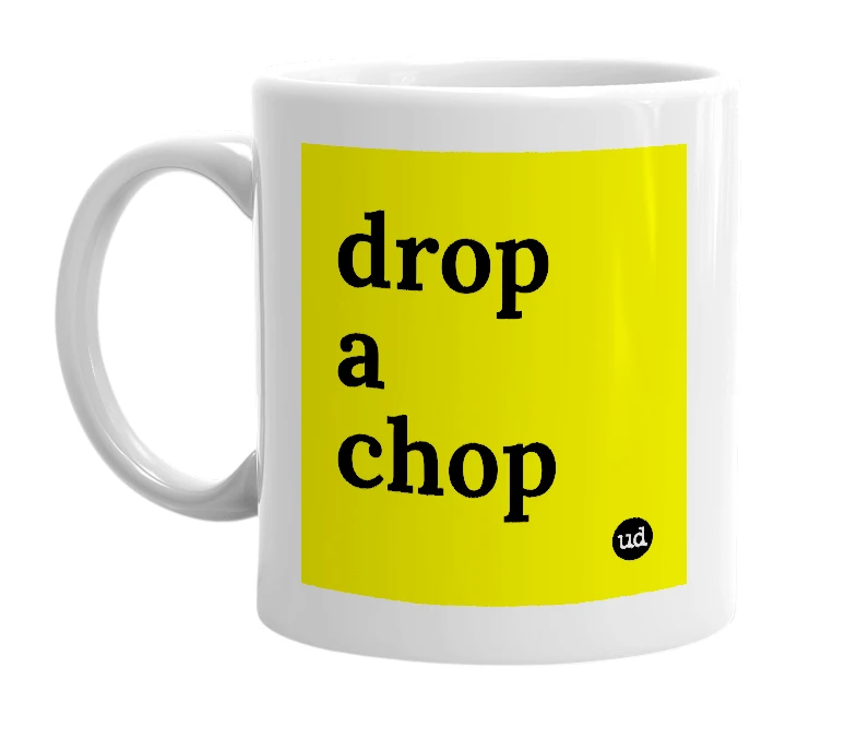 White mug with 'drop a chop' in bold black letters