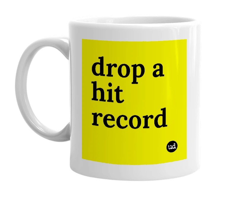 White mug with 'drop a hit record' in bold black letters