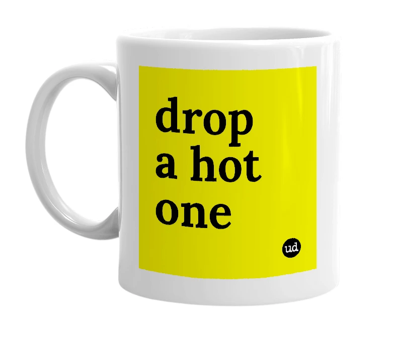 White mug with 'drop a hot one' in bold black letters