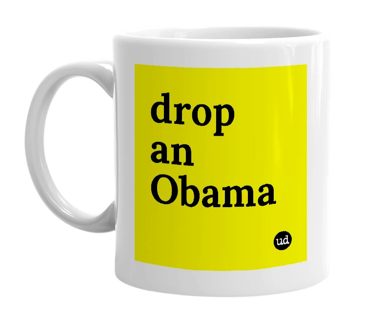 White mug with 'drop an Obama' in bold black letters