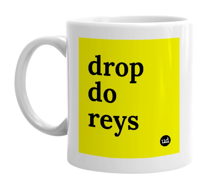 White mug with 'drop do reys' in bold black letters