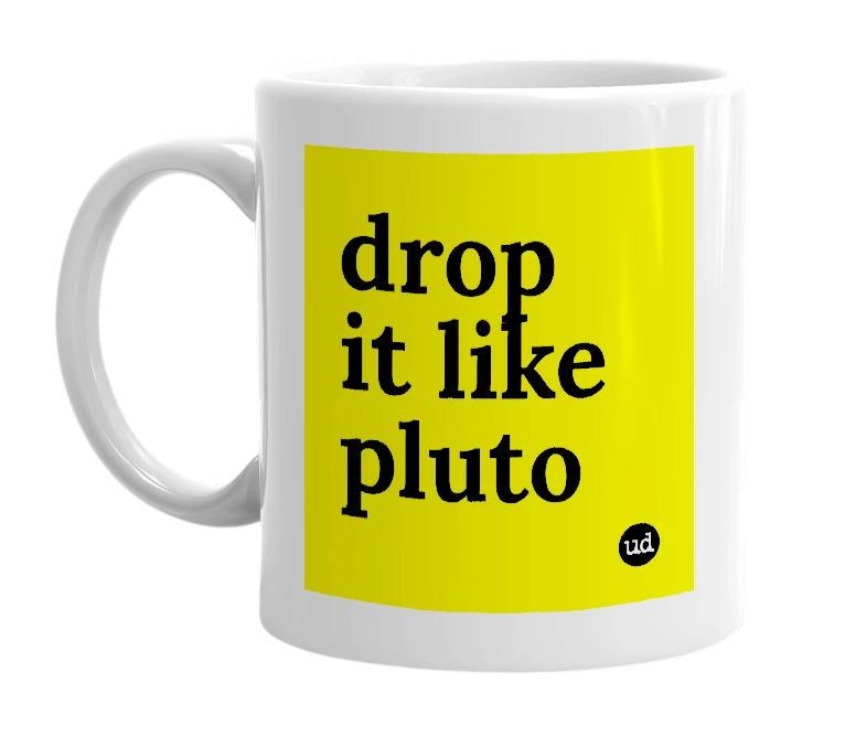 White mug with 'drop it like pluto' in bold black letters