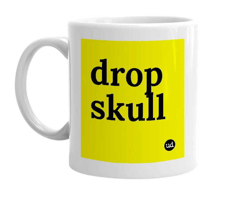 White mug with 'drop skull' in bold black letters