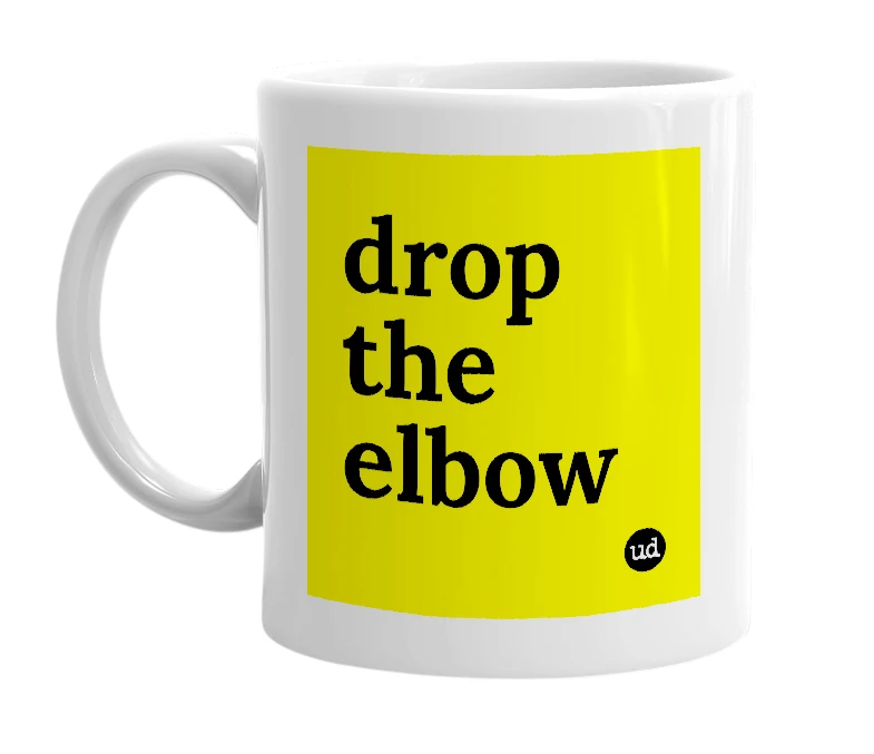 White mug with 'drop the elbow' in bold black letters