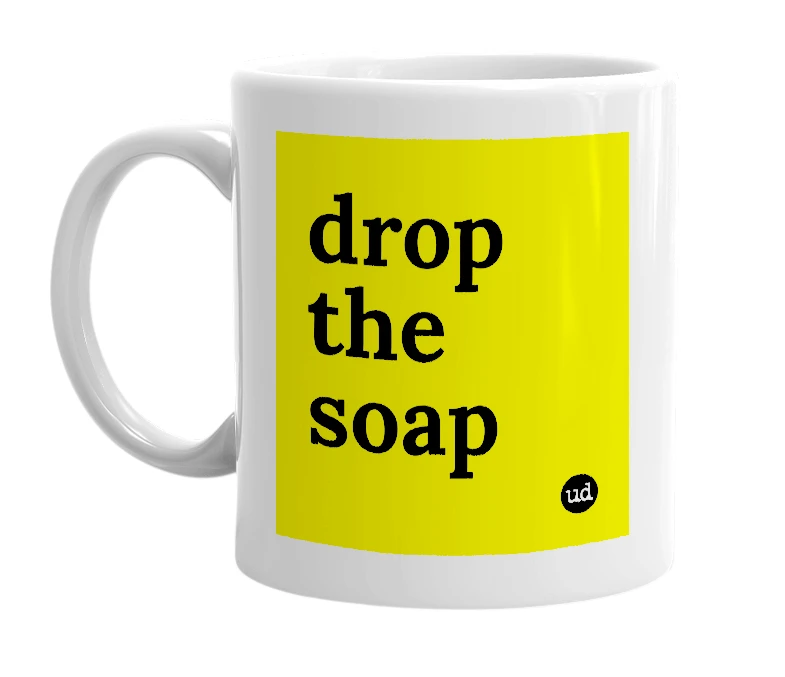 White mug with 'drop the soap' in bold black letters