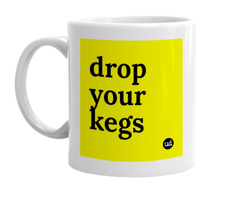 White mug with 'drop your kegs' in bold black letters