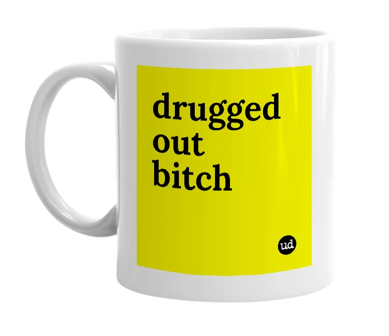 White mug with 'drugged out bitch' in bold black letters