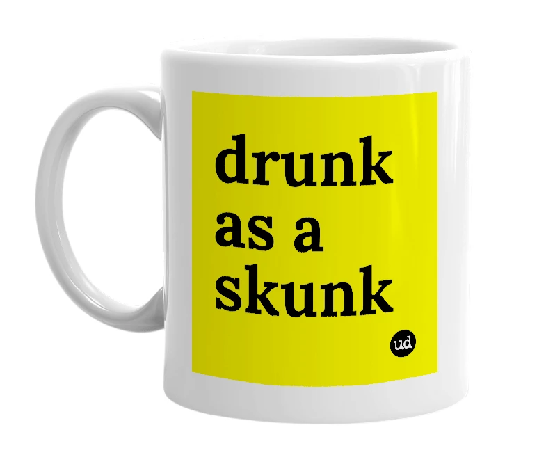 White mug with 'drunk as a skunk' in bold black letters
