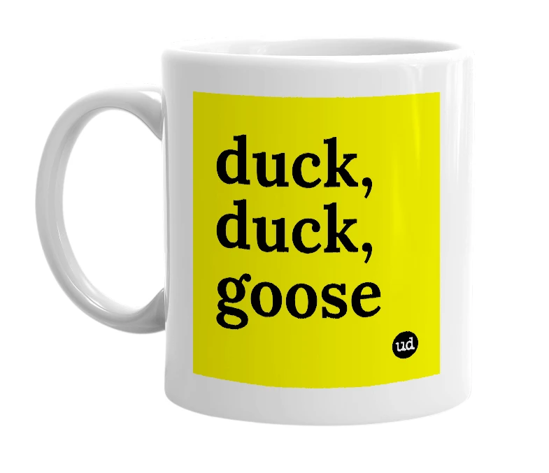 White mug with 'duck, duck, goose' in bold black letters