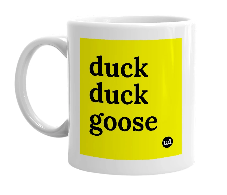 White mug with 'duck duck goose' in bold black letters