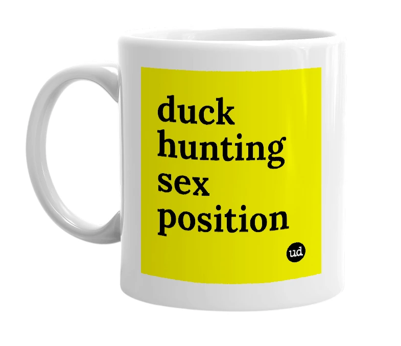 White mug with 'duck hunting sex position' in bold black letters