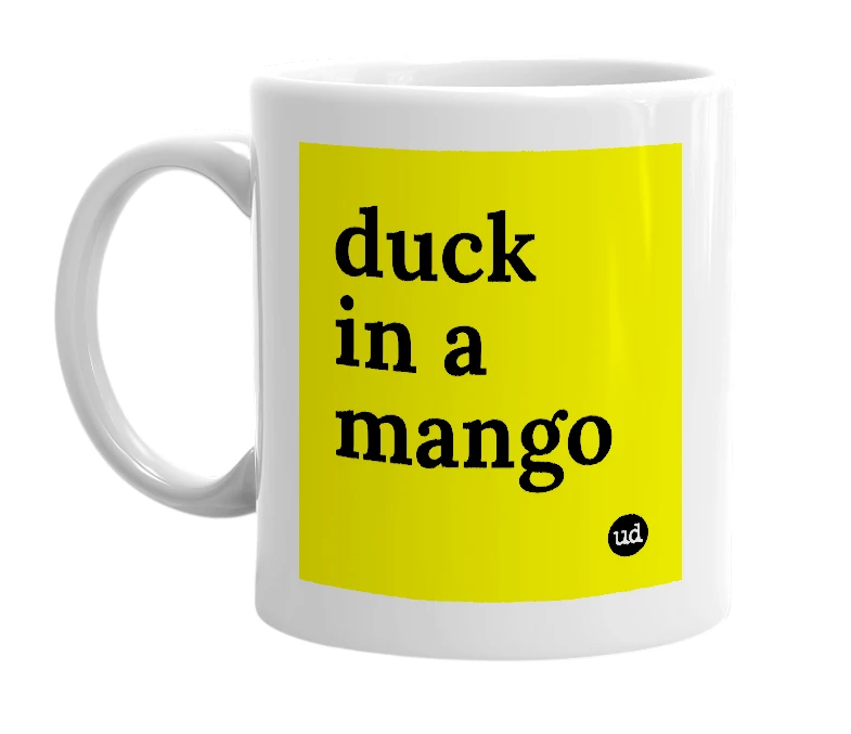 White mug with 'duck in a mango' in bold black letters
