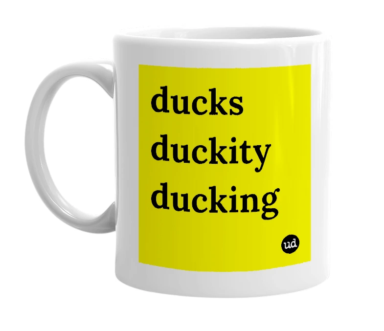 White mug with 'ducks duckity ducking' in bold black letters