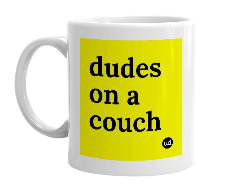 White mug with 'dudes on a couch' in bold black letters