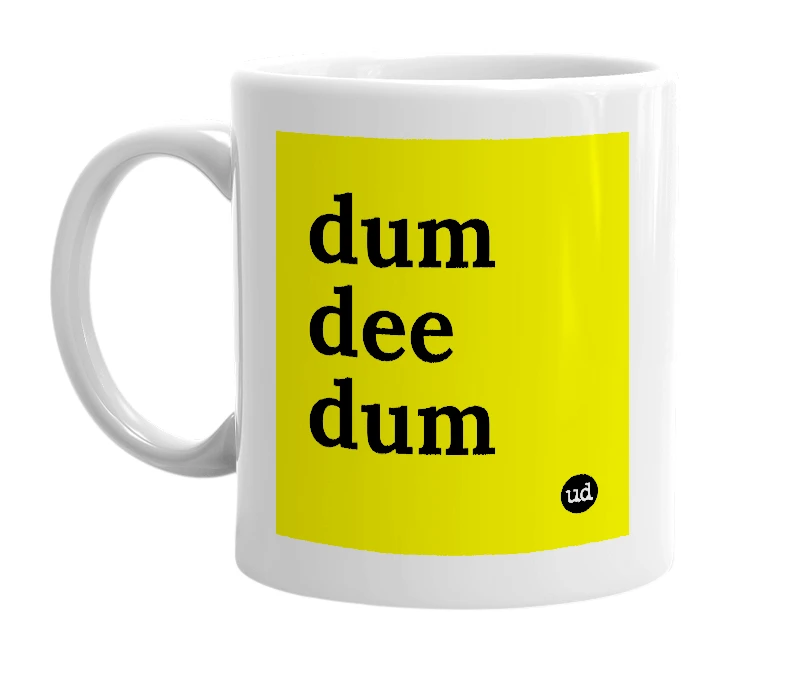 White mug with 'dum dee dum' in bold black letters