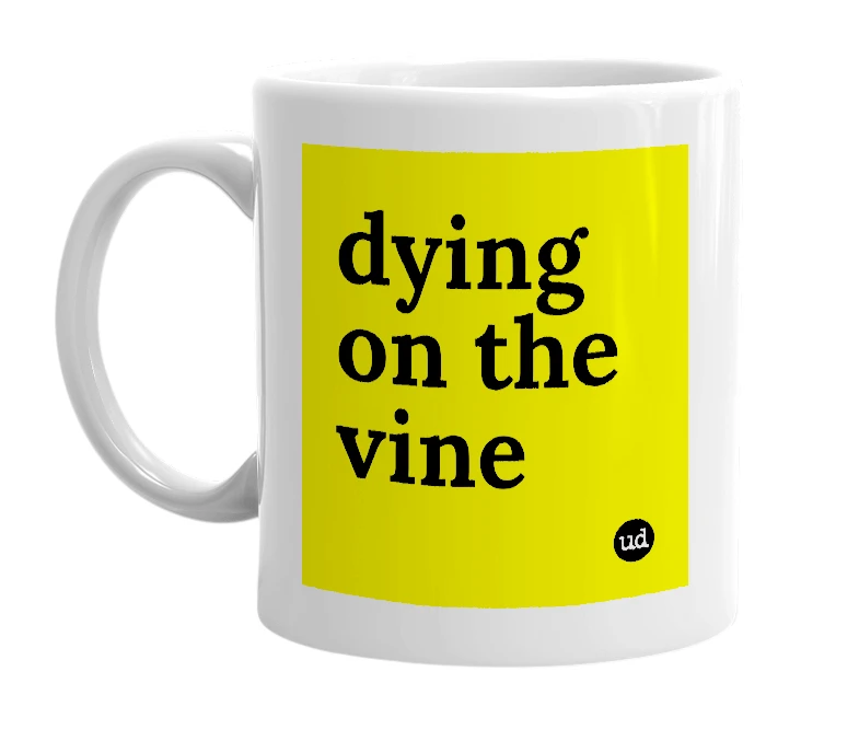 White mug with 'dying on the vine' in bold black letters