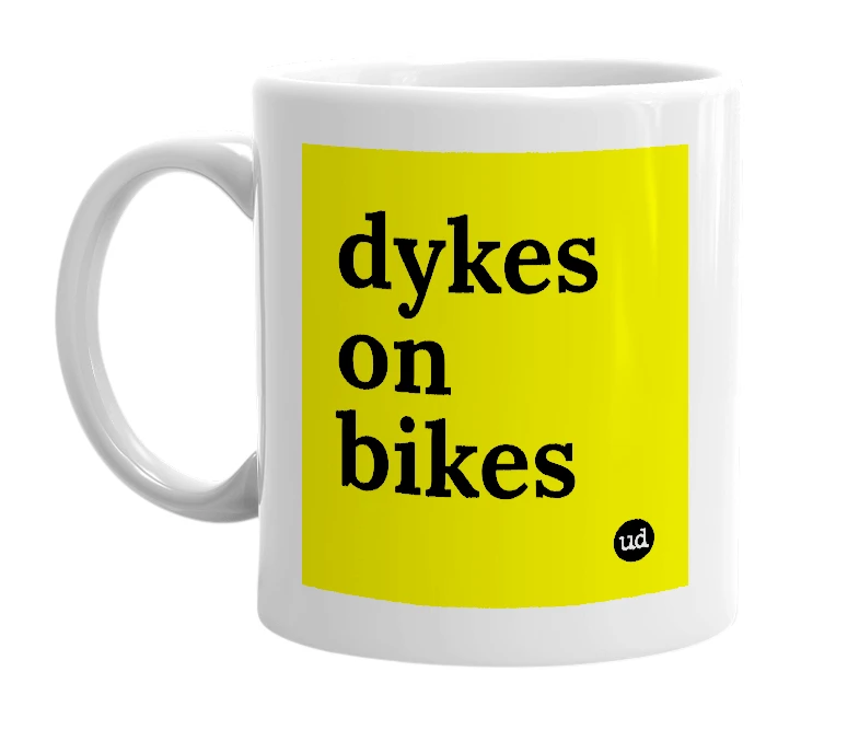 White mug with 'dykes on bikes' in bold black letters