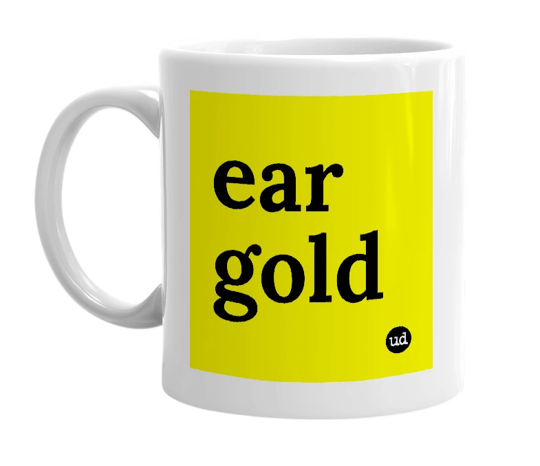White mug with 'ear gold' in bold black letters