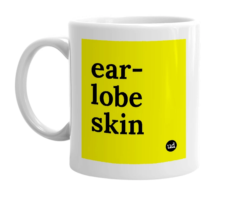 White mug with 'ear-lobe skin' in bold black letters