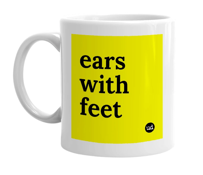 White mug with 'ears with feet' in bold black letters