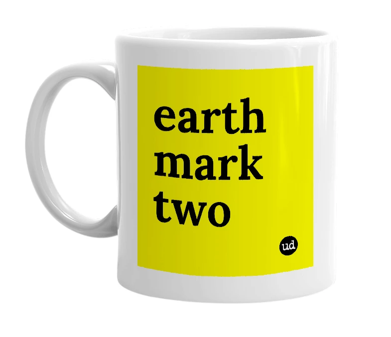 White mug with 'earth mark two' in bold black letters