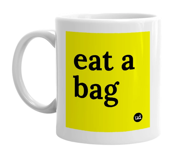 White mug with 'eat a bag' in bold black letters