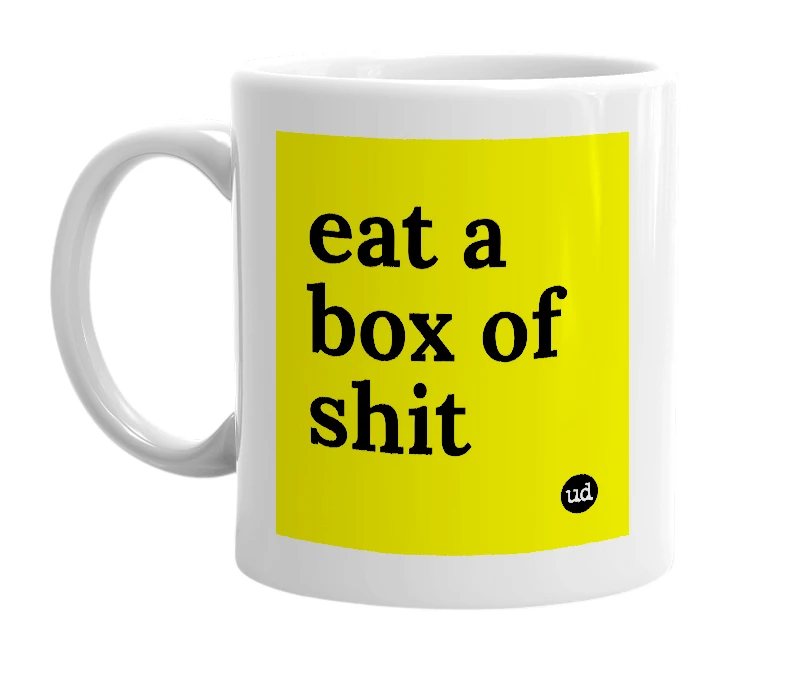 White mug with 'eat a box of shit' in bold black letters