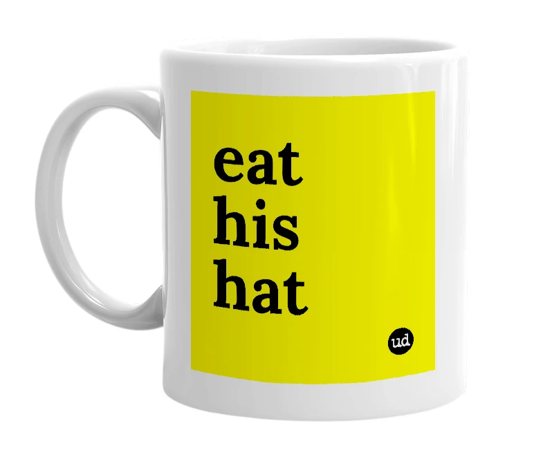 White mug with 'eat his hat' in bold black letters