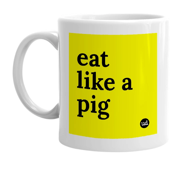 White mug with 'eat like a pig' in bold black letters