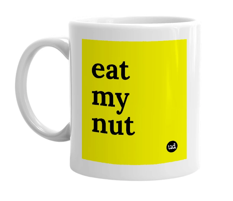 White mug with 'eat my nut' in bold black letters