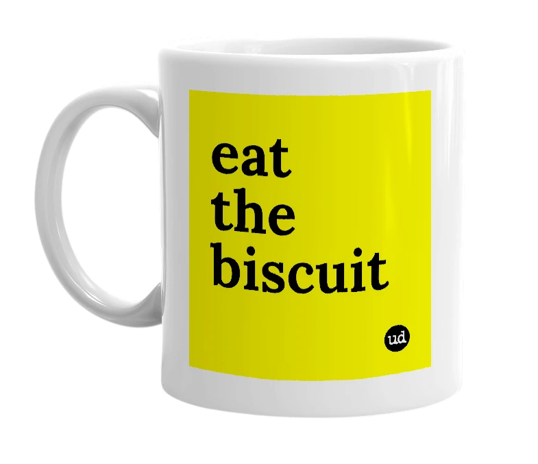 White mug with 'eat the biscuit' in bold black letters